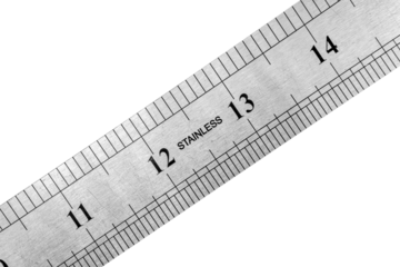 Close up of metal steel ruler with stainless signage is isolated on white background.