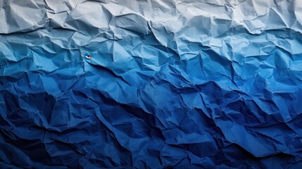Obraz premium Crumpled Blue Paper Gradient Texture Background (1)