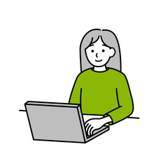 パソコンに向かう女性　グリーン