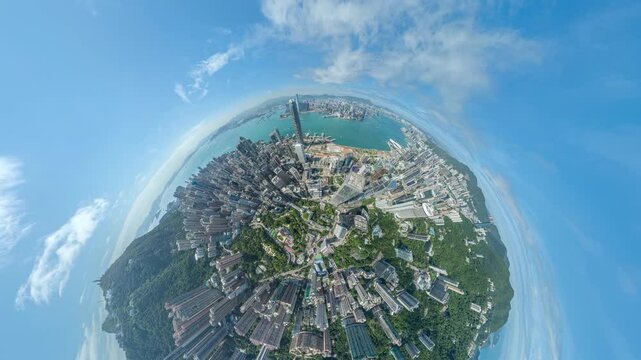 A 4k still video frame shows a Hong Kong aerial view, zoomed in, creating a little planet effect.