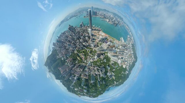 A 4k still video frame shows a zoomed-in aerial view of Hong Kong's cityscape, transformed into a tiny planet effect.
