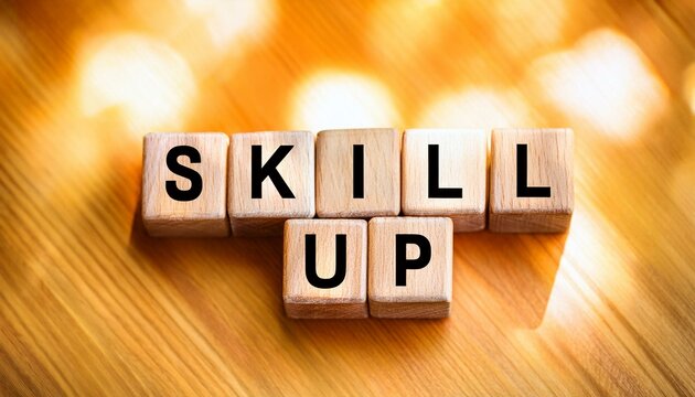 スキルアップを意味する英語のフレーズSKILL UPの文字が書かれたキューブブロック。 aiで生成