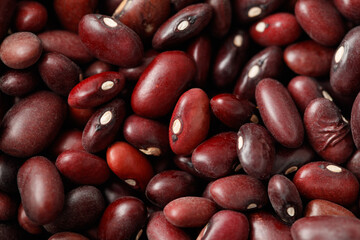 A bunch of red beans are piled on top of each other