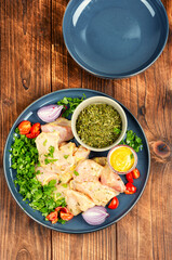 Raw marinated chicken meat cilantro herb.