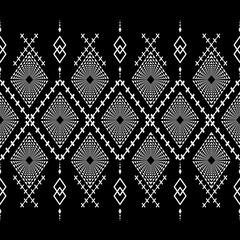 The geometric ethnic pattern of traditional style. Navajo, America Indian patterns. Design for background, wallpaper, clothing, wrapping, Batik, fabric, and prints. Vector illustration.