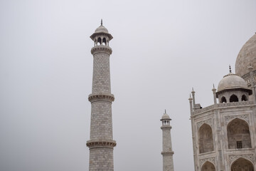 Amazing view of Taj Mahal which is among seven world wonders. Famous Indian Islamic heritage at cloudy day, Taj Mahal located at south bank of the Yamuna River