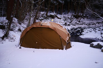 tent covered in snow