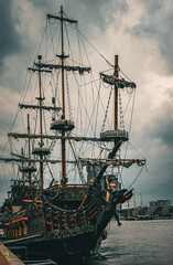 Ghosty flying dutchman ship and stormy sky	