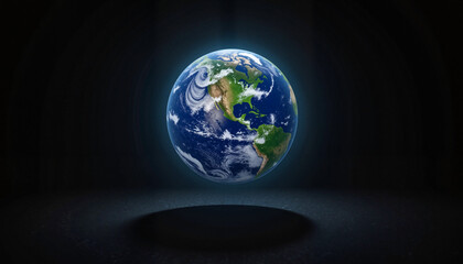 Fototapeta premium Floating Earth globe against dark background