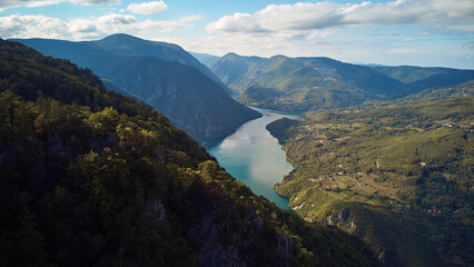 Obraz premium Drone aerial footage of river Drina and Tara mountain landscape..