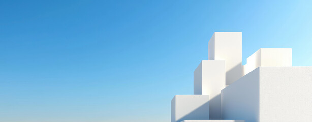 Fototapeta premium Minimalist geometric structures rise against clear blue sky, creating serene atmosphere