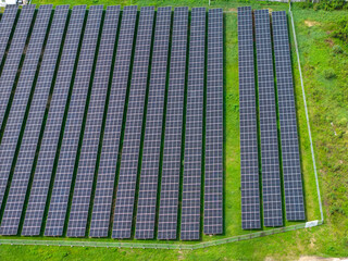 Rows of solar panels from above. Solar farm, renewable energy infrastructure, photovoltaic technology