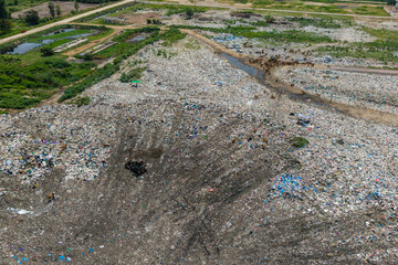 Landfill site, aerial view. Waste management, garbage disposal, environmental concerns.