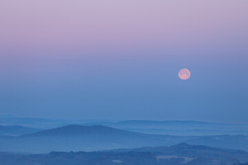 Moonlit Dawn over Misty Hills