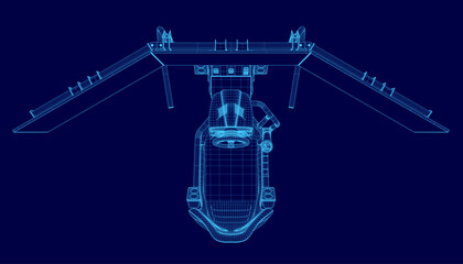 A blue computer monitors with a steering wheel. Top view