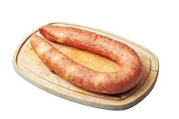 homemade krakow sausage lying on oak board isolated on white