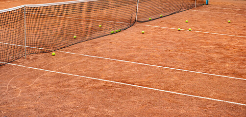tennis balls on the clay court