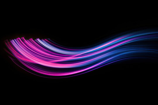 Abstract vibrant light streaks flowing on black background