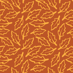 Warm autumn leaf pattern in vibrant orange background suitable for seasonal decor and textiles
