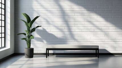 Minimalist room with bench, plant, and brick wall.