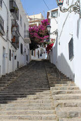 Colorful old steps in the city streets of Altea, Spain