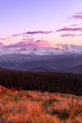 landscape view sunset or sunrise in the winter mountain and snowy peak, travel outdoor, beauty of nature, postcard or poster