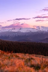 Fotobehang Purper landscape view sunset or sunrise in the winter mountain and snowy peak, travel outdoor, beauty of nature, postcard or poster  © Hordina Anastasia 