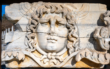 The ruins of Didyma are located a short distance to the northwest of modern Didim in Aydın Province, Turkey. It sits on a headland that in antiquity formed the Milesian Peninsula. Didyma was the large