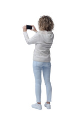 Young woman taking pictures with her smartphone