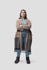 Portrait of a woman standing with arms crossed