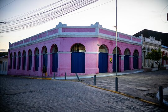 Fototapeta Colorful buildings line a street in Marechal Deodoro, Alagoas, Brazil.