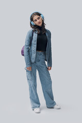 Portrait of a young woman wearing headphones