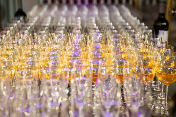 Festive buffet at the event with glasses of wine and champagne