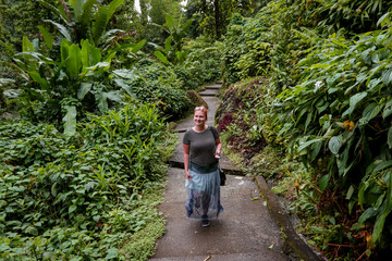 Exploring lush trails in Dominicas vibrant rainforests during a tropical adventure