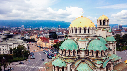 View of Alexander Nevsky Cathedral and Sofia cityscape under cloudy sky