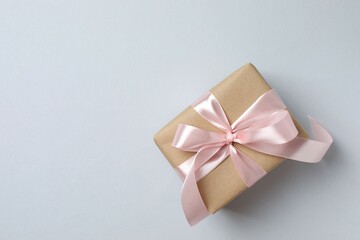 Beautiful gift box on pink background