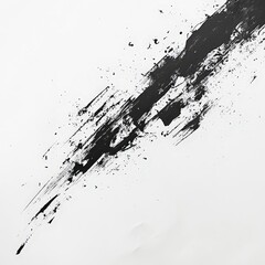 Fototapeta premium Black ink splat on a clean background with liquid drops and splashes creating a textured design