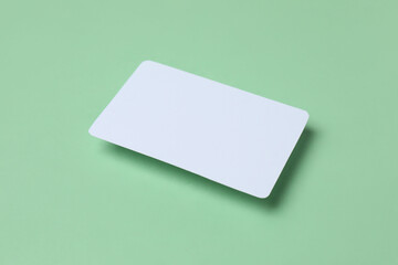 White paper card on green background