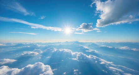 Fototapeta premium Sky landscape with dramatic clouds and sun rays shining through atmosphere in bright blue sky Copy Space