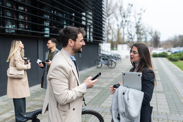 Professional occupation, office workers. Business people meet before staff meeting and presentation...