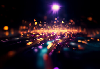 Obraz premium Abstract image featuring blurry and vibrant lights on a dark backdrop, creating a dynamic and energetic feel with a sense of movement and sparkling illumination.