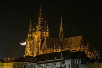 Obraz premium Prague castle with Moon (Czech Republic)