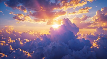 Colorful sunset over a sky filled with fluffy clouds illuminated by soft golden light with vibrant hues and Copy Space for text placement