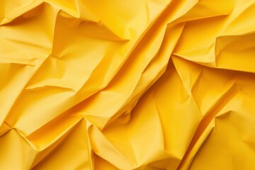 Wrinkled yellow fabric background for textures, arts and crafts, and backgrounds