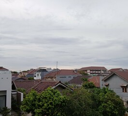 Residential Neighborhood with Rooftops and Greenery