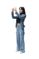 Young stylish woman taking pictures with her smartphone