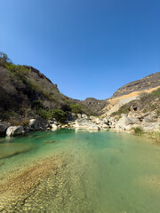 Fototapeta premium Wild Wadi Sayq pools located next to Yemen border in Southern Oman