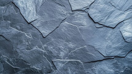 Dark Gray Slate Texture: A detailed close-up shot reveals the intricate textures and patterns of dark gray slate stones, showcasing their rugged, natural beauty.