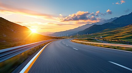 Naklejka premium Stunning eco industrial park featuring renewable energy sources and a picturesque mountain landscape at sunset The winding highway leads through a serene energy efficient environment