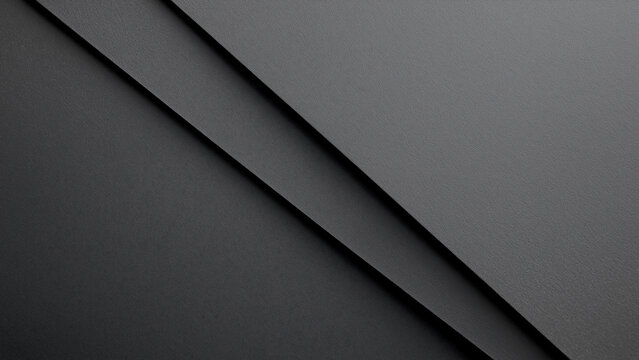 Close-up of a dark gray paper background, featuring a diagonal split for text overlays and sleek layouts.